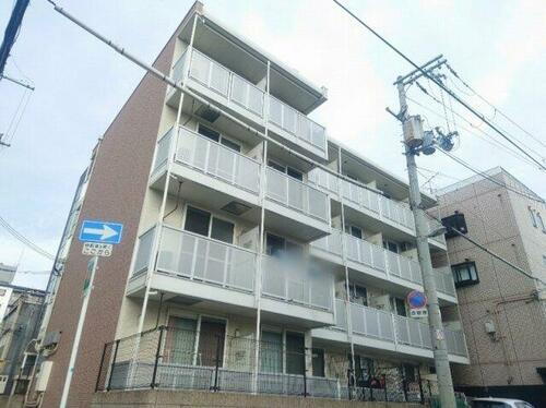 レオパレストウメイ 4階建