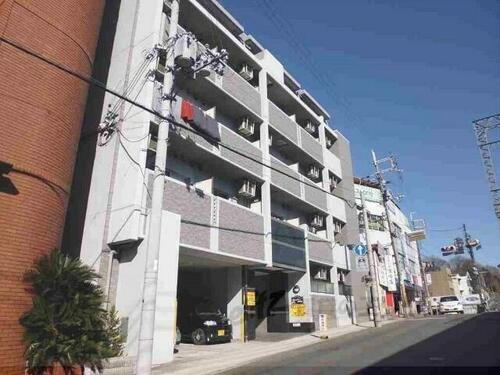 サンシャイン富雄駅前 5階建