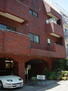 セザール武蔵野 赤レンガ色の外壁タイル張り　１階の奥から3番目のお部屋です。