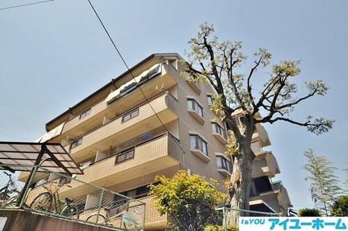 エミネンス穴生 4階建