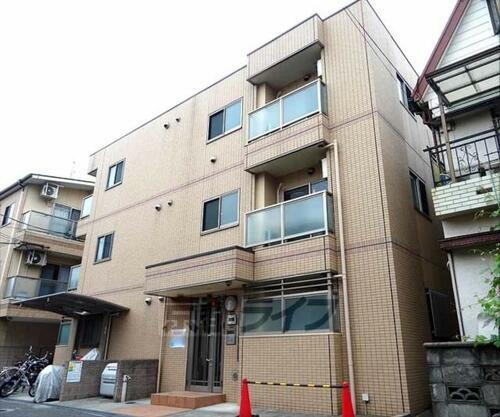 大阪府枚方市磯島茶屋町 3階建