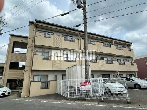 丸周マンション
