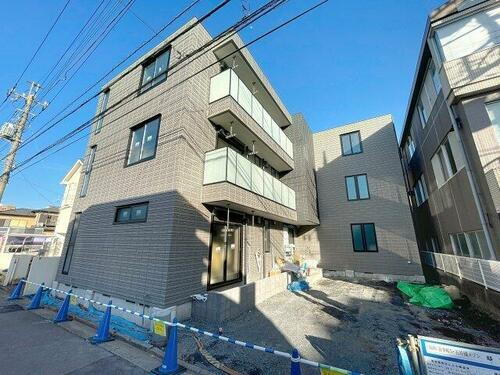 グランソレイユ 3階建