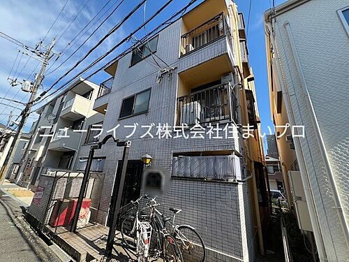 大阪府寝屋川市萱島桜園町 築35年 4階建