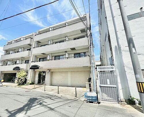 大阪府吹田市日の出町 築32年8ヶ月 4階建