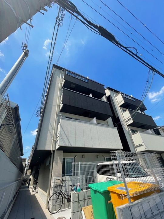 エヌエムスワサントセットウエスト 4階建
