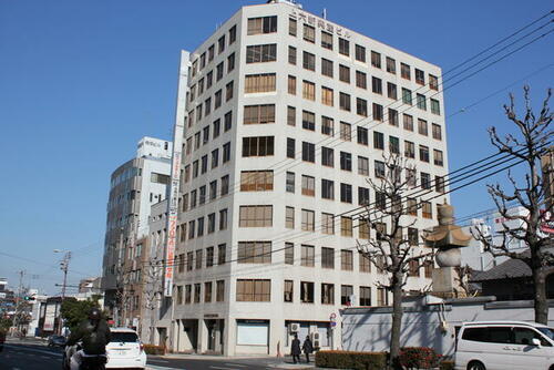 上六新興産ビル