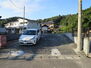 オレンジ　仁井田町月山下　建物解体後更地　売地 前面道路含む現地写真