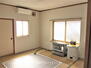 唐竹苺原（平賀駅）　５５０万円 冷暖房・床暖システム完備のリビング。エアコン・ストーブもお譲りしますので、そのままお住まいいただけます。