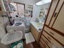 清和台西３　１３８０万円 たっぷりの収納を設けたシャワー付洗面台で快適な暮らし