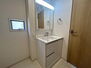 生駒市新旭ケ丘　新築一戸建て　２号棟 収納たっぷりのキャビネットは、使いやすく清潔感のある洗面室に！