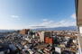 コートパセフィコ福島 南面バルコニーからの眺望（山々を望む）