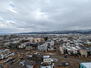 サーパスシティ今朝白参番館イーストウイング リビングの東向き窓から東山方面の眺望