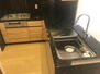 プラウドタワー名古屋丸の内 ブラックの大理石天板がおしゃれなキッチン。食洗器、浄水器、ディスポーザー付き