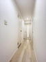 朝日プラザ東加古川レジデンス 【リフォーム済】廊下の写真です。リフォームで床の重ね張り、クロス張替え、照明交換等を行いました。