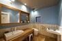 豊津パロス山手町二番館Ａ棟 シンプル、ベーシックな洗面化粧台です！自然素材の塗壁と、ラフなウッドパネルの組み合わせ。おむつ交換台を備え付けています。また、授乳室も兼ねております！